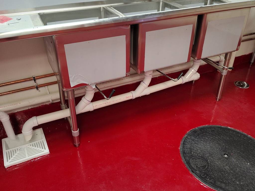 Commercial kitchen sink plumbing installed by Urban Plumbing