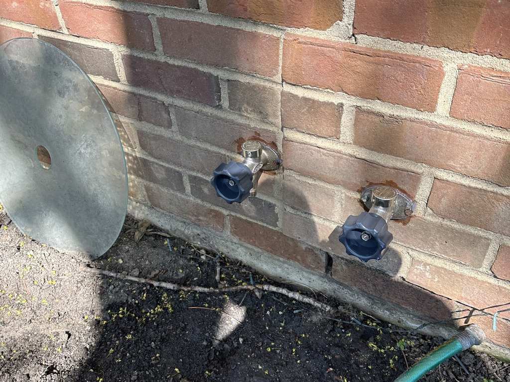 Outdoor hose bibs replaced on a brick home by Urban Plumbing